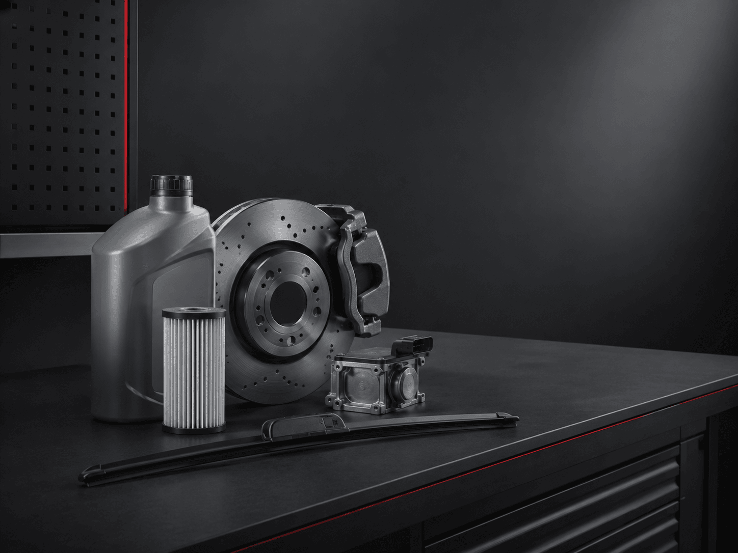 Genuine BYD spare parts on a workshop bench